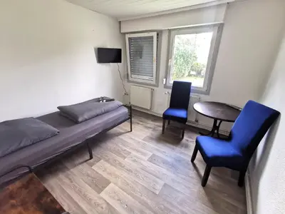 Ein Sitzbereich in der Unterkunft Monteur-Haus Agave Berlin Treptow, Neukölln, Altglienicke