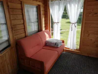 Ein Sitzbereich in der Unterkunft Sommerferienhaus Jeannette