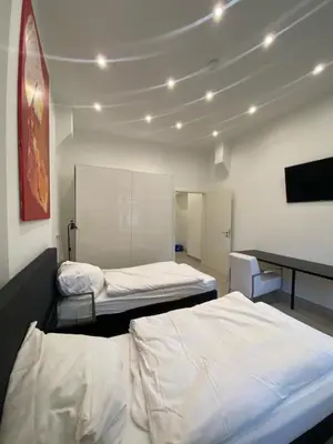 Ein Bett oder Betten in einem Zimmer der Unterkunft Villa Wittenau Ferienwohnung EG