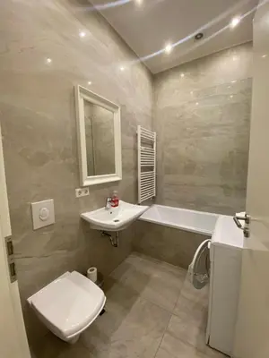 Ein Badezimmer in der Unterkunft Villa Wittenau Ferienwohnung EG