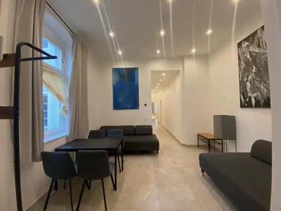 Ein Sitzbereich in der Unterkunft Villa Wittenau Ferienwohnung EG