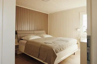 Ein Bett oder Betten in einem Zimmer der Unterkunft Mein rotes Haus
