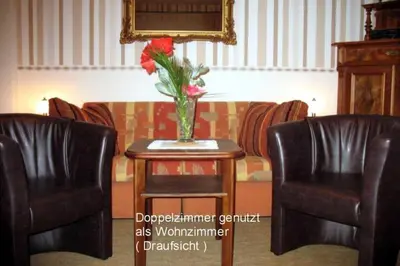 Ein Sitzbereich in der Unterkunft Ferienwohnung am Rentierweg