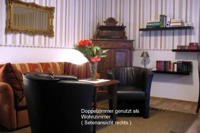 Ein Sitzbereich in der Unterkunft Ferienwohnung am Rentierweg