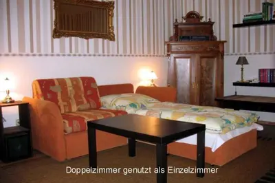 Ein Sitzbereich in der Unterkunft Ferienwohnung am Rentierweg