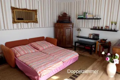 Ein Bett oder Betten in einem Zimmer der Unterkunft Ferienwohnung am Rentierweg