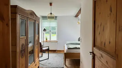 Ein Bett oder Betten in einem Zimmer der Unterkunft Ferienwohnung - Der Schwarzstorch