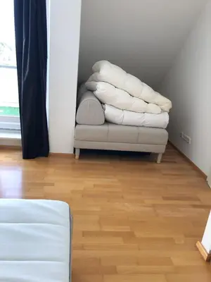 Ein Sitzbereich in der Unterkunft Maisonette Dachterrasse Golfplatz