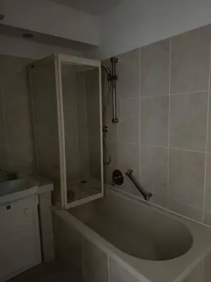 Ein Badezimmer in der Unterkunft Maisonette Dachterrasse Golfplatz