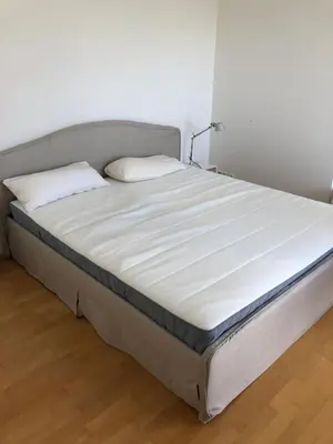 Ein Bett oder Betten in einem Zimmer der Unterkunft Maisonette Dachterrasse Golfplatz