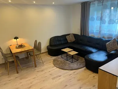 Ein Sitzbereich in der Unterkunft Apartment Hukic mit 2 Schlafzimmer