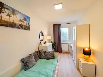 Ein Bett oder Betten in einem Zimmer der Unterkunft 4-Zimmerapartment in Oranienburg