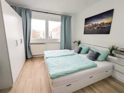 Ein Bett oder Betten in einem Zimmer der Unterkunft 4-Zimmerapartment in Oranienburg