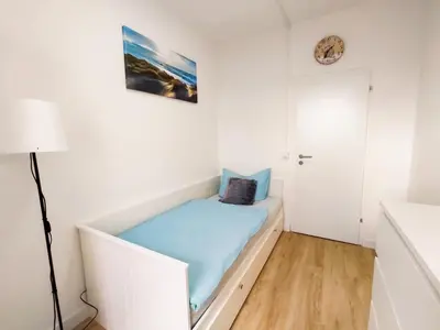Ein Bett oder Betten in einem Zimmer der Unterkunft 4-Zimmerapartment in Oranienburg