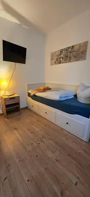 Ein Bett oder Betten in einem Zimmer der Unterkunft Waldpension Gussow