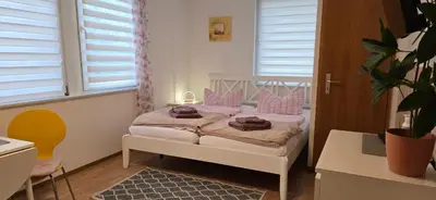 Ein Bett oder Betten in einem Zimmer der Unterkunft Waldpension Gussow