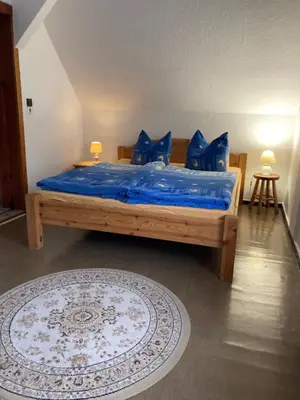 Ein Bett oder Betten in einem Zimmer der Unterkunft Ferienwohnung in der Schorfheide