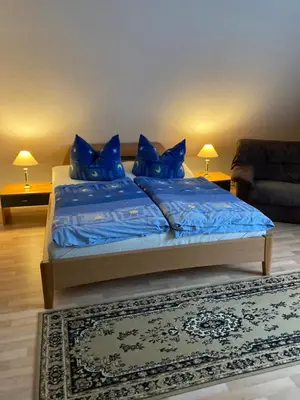 Ein Bett oder Betten in einem Zimmer der Unterkunft Ferienwohnung in der Schorfheide