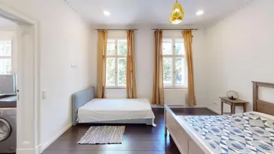 Ein Bett oder Betten in einem Zimmer der Unterkunft Villa Wittenau Ferienwohnung 3