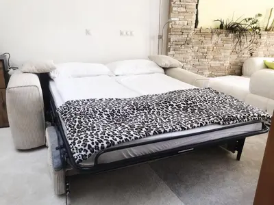 Ein Bett oder Betten in einem Zimmer der Unterkunft NexLiving Berlin Brandenburger Tor