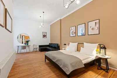 Ein Bett oder Betten in einem Zimmer der Unterkunft Holiday 33 Apartment M Schönhauser Allee