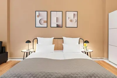Ein Bett oder Betten in einem Zimmer der Unterkunft Holiday 33 Apartment M Schönhauser Allee