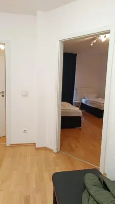 Ein Bett oder Betten in einem Zimmer der Unterkunft Great Central City Apartments