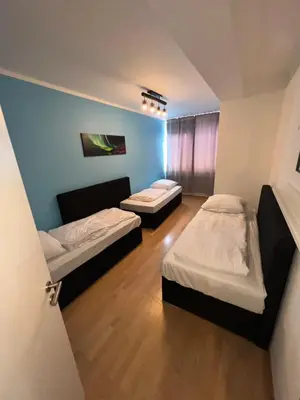 Ein Bett oder Betten in einem Zimmer der Unterkunft Great Central City Apartments