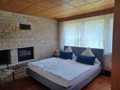 Ein Bett oder Betten in einem Zimmer der Unterkunft Ferienhaus am Bauernsee