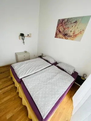 Ein Bett oder Betten in einem Zimmer der Unterkunft Tolle zentrale Stadtwohnung in Berlin-Weißensee-Prenzlauer Berg