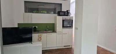 Küche/Küchenzeile in der Unterkunft Zentrales Gartenhaus Loft in Berlin