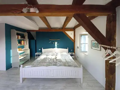 Ein Bett oder Betten in einem Zimmer der Unterkunft Ferienwohnung Schwalbennest