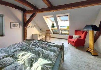 Ein Bett oder Betten in einem Zimmer der Unterkunft Ferienwohnung Schwalbennest
