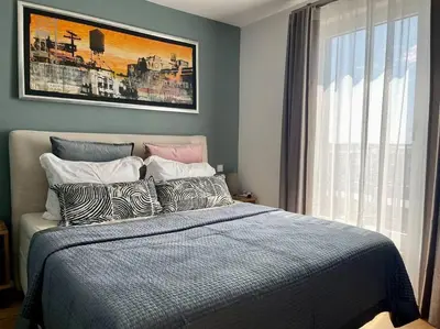 Ein Bett oder Betten in einem Zimmer der Unterkunft Rooftop Apartment,Business trip,Fast Internet