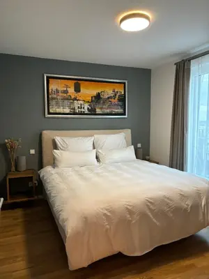 Ein Bett oder Betten in einem Zimmer der Unterkunft Rooftop Apartment,Business trip,Fast Internet