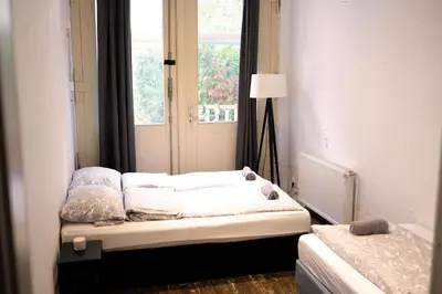 Ein Bett oder Betten in einem Zimmer der Unterkunft Urban Loft in Vibrant Kreuzkölln