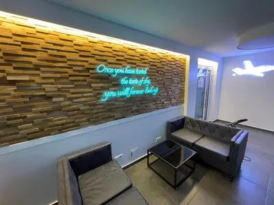 Ein Sitzbereich in der Unterkunft Aviators Guest House - Premium Room