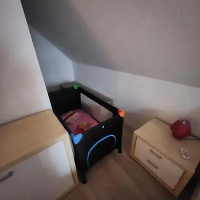 Ein Bett oder Betten in einem Zimmer der Unterkunft Ferienhaus LEMA