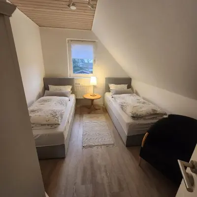 Ein Bett oder Betten in einem Zimmer der Unterkunft Ferienhaus LEMA