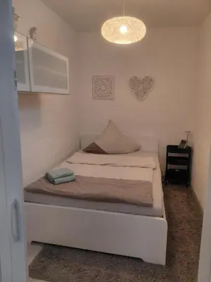 Ein Bett oder Betten in einem Zimmer der Unterkunft Waldblick