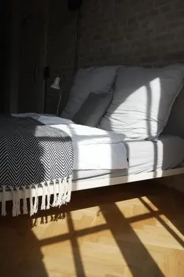 Ein Bett oder Betten in einem Zimmer der Unterkunft Loft Studio in historic factory building