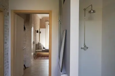Ein Badezimmer in der Unterkunft Loft Studio in historic factory building
