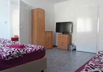 Ein Bett oder Betten in einem Zimmer der Unterkunft Lucky Hostel