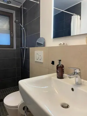 Ein Badezimmer in der Unterkunft Appartement Kirschblüte
