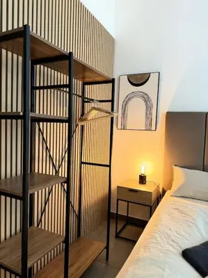 Ein Bett oder Betten in einem Zimmer der Unterkunft Kleines stilvolles Apartment