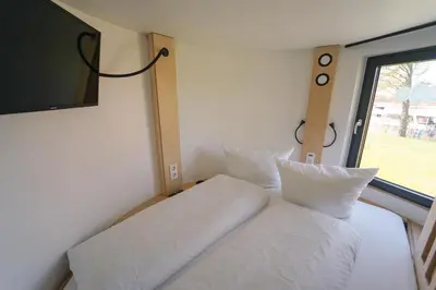 Ein Bett oder Betten in einem Zimmer der Unterkunft slube an der Marina Zehdenick
