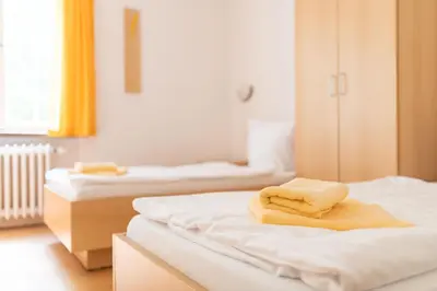 Ein Bett oder Betten in einem Zimmer der Unterkunft budget seezeit-resort am Werbellinsee