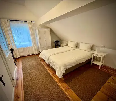 Ein Bett oder Betten in einem Zimmer der Unterkunft Pension Försterhof