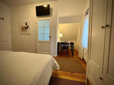 Ein Bett oder Betten in einem Zimmer der Unterkunft Pension Försterhof