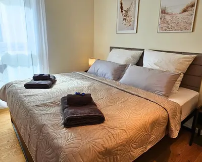 Ein Bett oder Betten in einem Zimmer der Unterkunft RelaxRefugium LUXUS - Küche, Arbeitsplätze, Stellplatz & Komfort für bis 6 Gäste